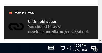 Beispiel einer Benachrichtigung auf Windows 10, die sich oberhalb der Systemuhr befindet. Der fettgedruckte Titel lautet "Click notification", gefolgt von normalem Text mit der Aufschrift "You clicked https://developer.mozilla.org/de/docs/MDN". Die Benachrichtigung hat ein kleines Firefox-Logo in der oberen linken Ecke, gefolgt von "Mozilla Firefox", und ein Link-Symbol links von dem Hauptbenachrichtigungstext.