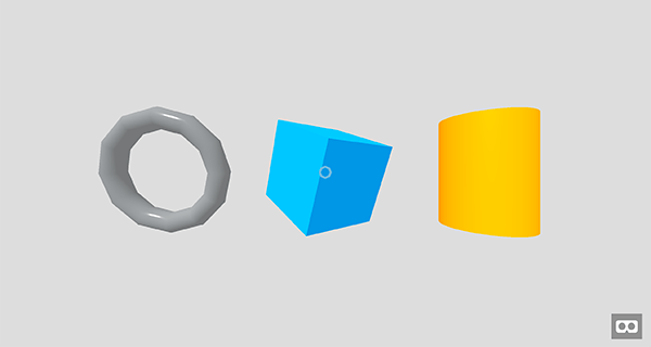 Illustration of three 3D geometry shapes: a grey torus, a blue cube, and a yellow cylinder.