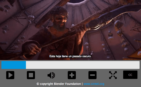 Video player with stand controls such as play, stop, volume, and captions on and off. The video playing shows a scene of a man holding a spear-like weapon, and a caption reads "Esta hoja tiene pasado oscuro."